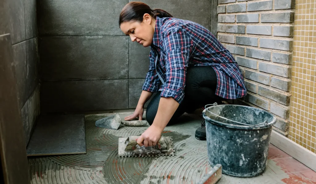 female mason laying tiles on a terrace 2025 03 17 20 56 53 utc